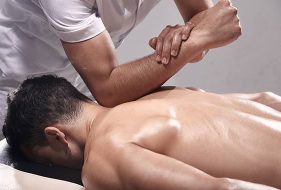 Man receiving deep tissue massage