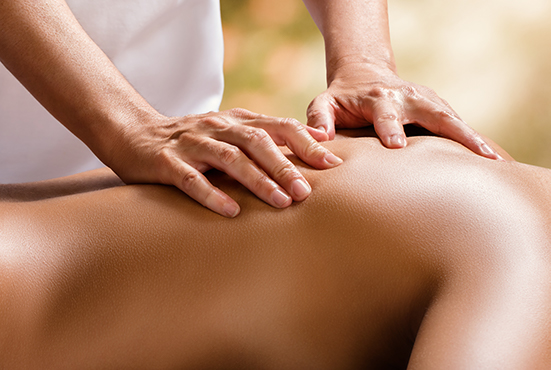 woman receiving deep tissue massage